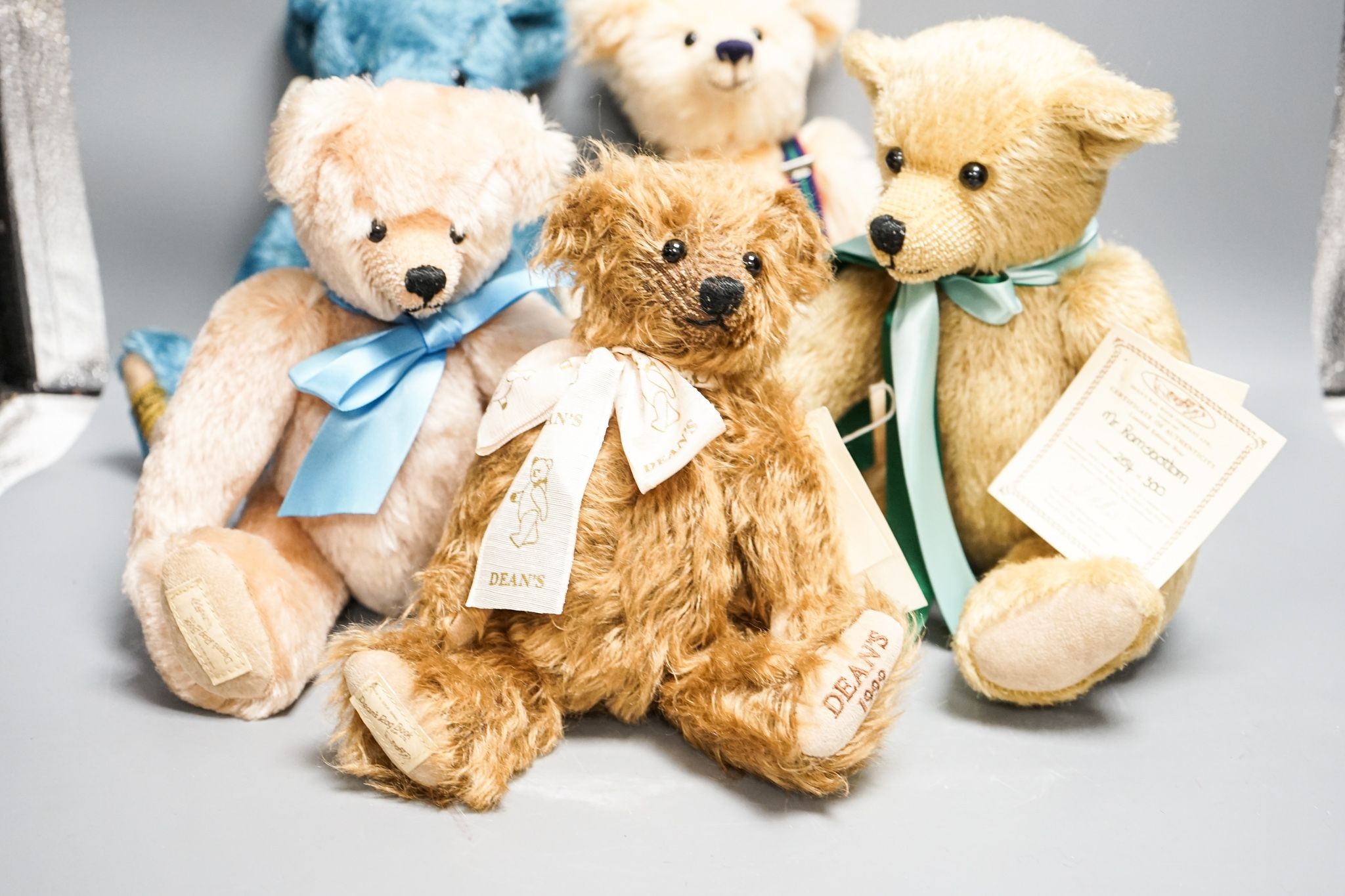 Four Deans Bears with certificates and one Merrythought